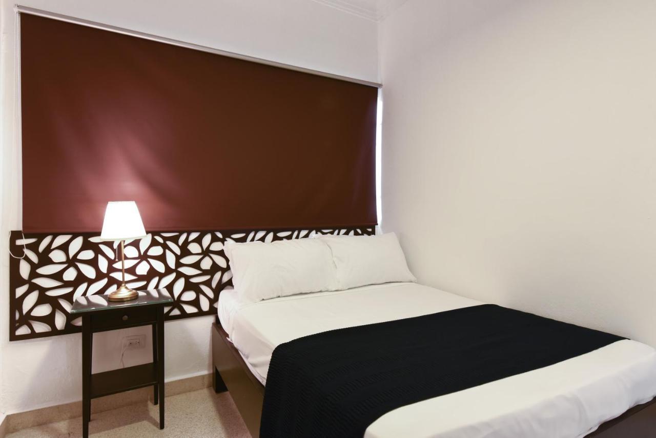 Ph 19 Guesthouse Hotel In Gazcue Santo Domingo Værelse billede